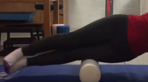 demonstration of using foam roller for therapy exercises
