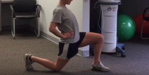 therapist demonstrating Hip Stretching exercise